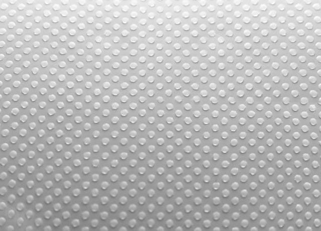 Close-up shot of SimpleTack's adhesive dot-pattern. 